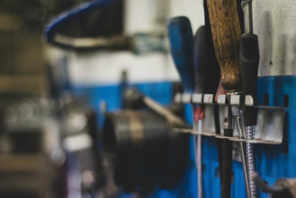 This is a photo of tools stacked on a shelf. 