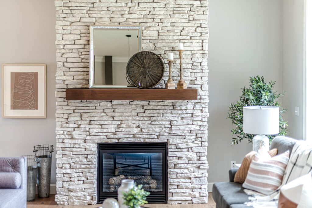 A fireplace heating a living room to save on heating bills. 